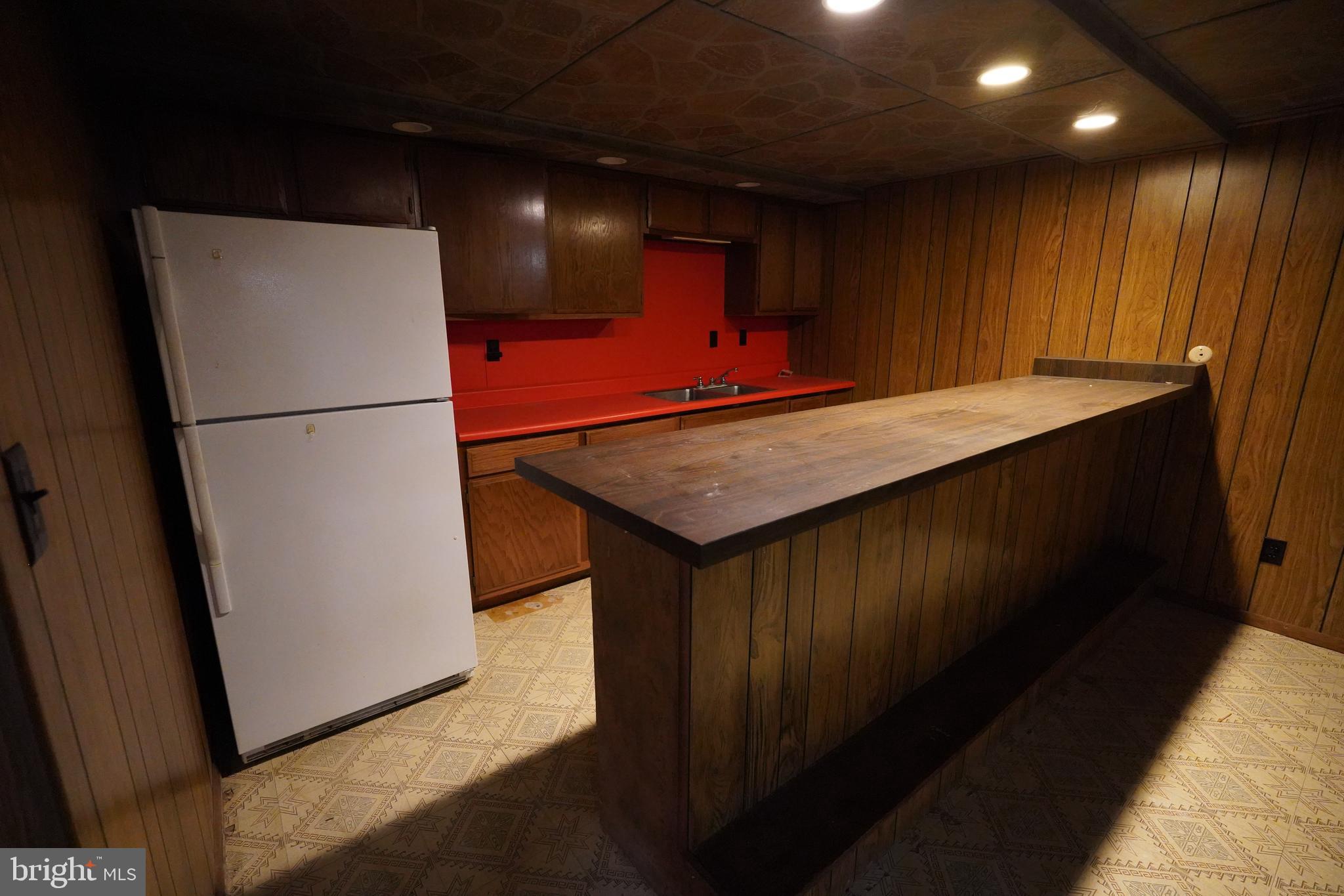 212 Seneca Circle State College, PA 16801 - Photo 19 of 67 a room with water heater and a refrigerator