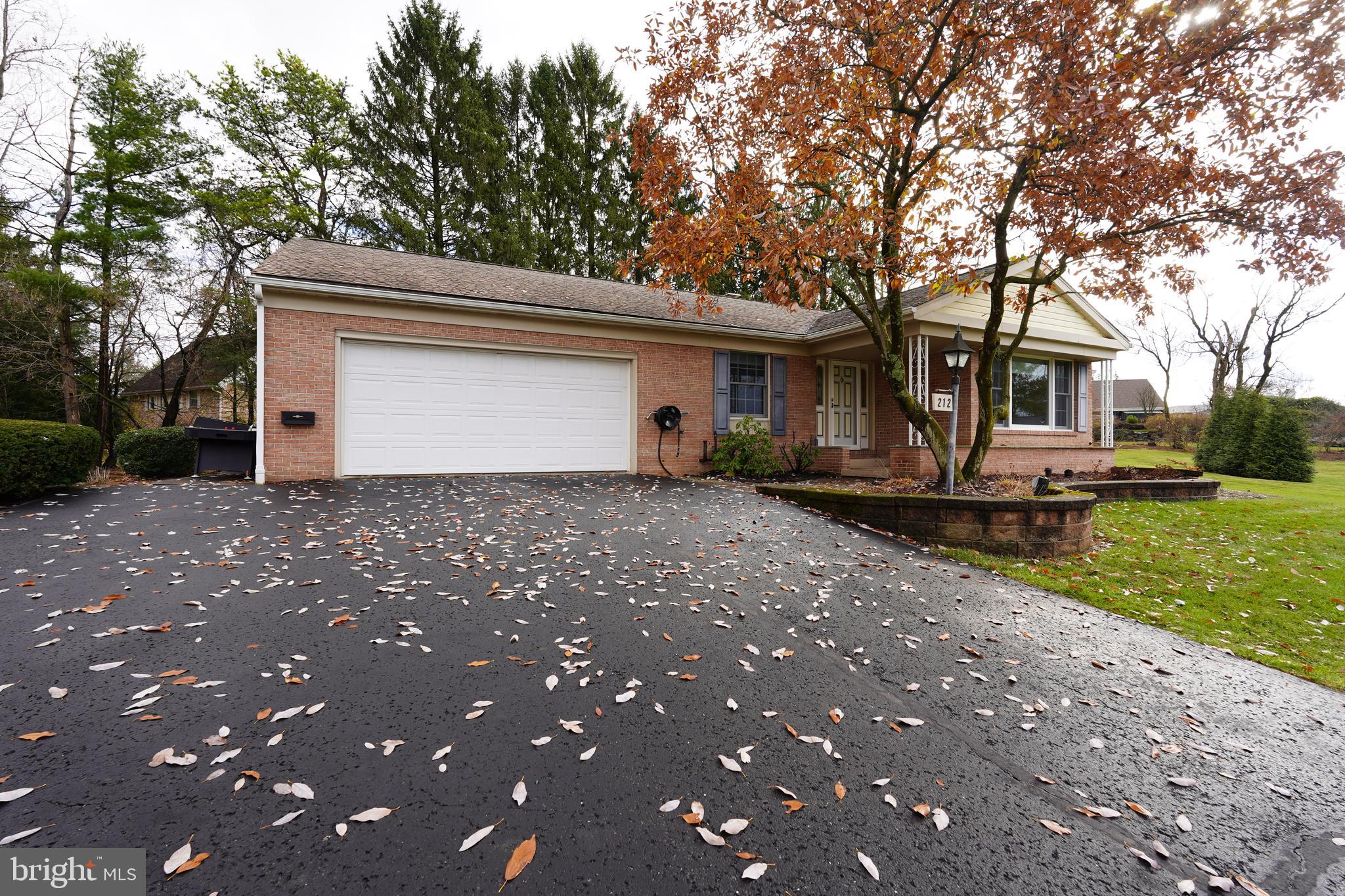 212 Seneca Circle State College, PA 16801 - Photo 2 of 67 a front view of house with yard and green space