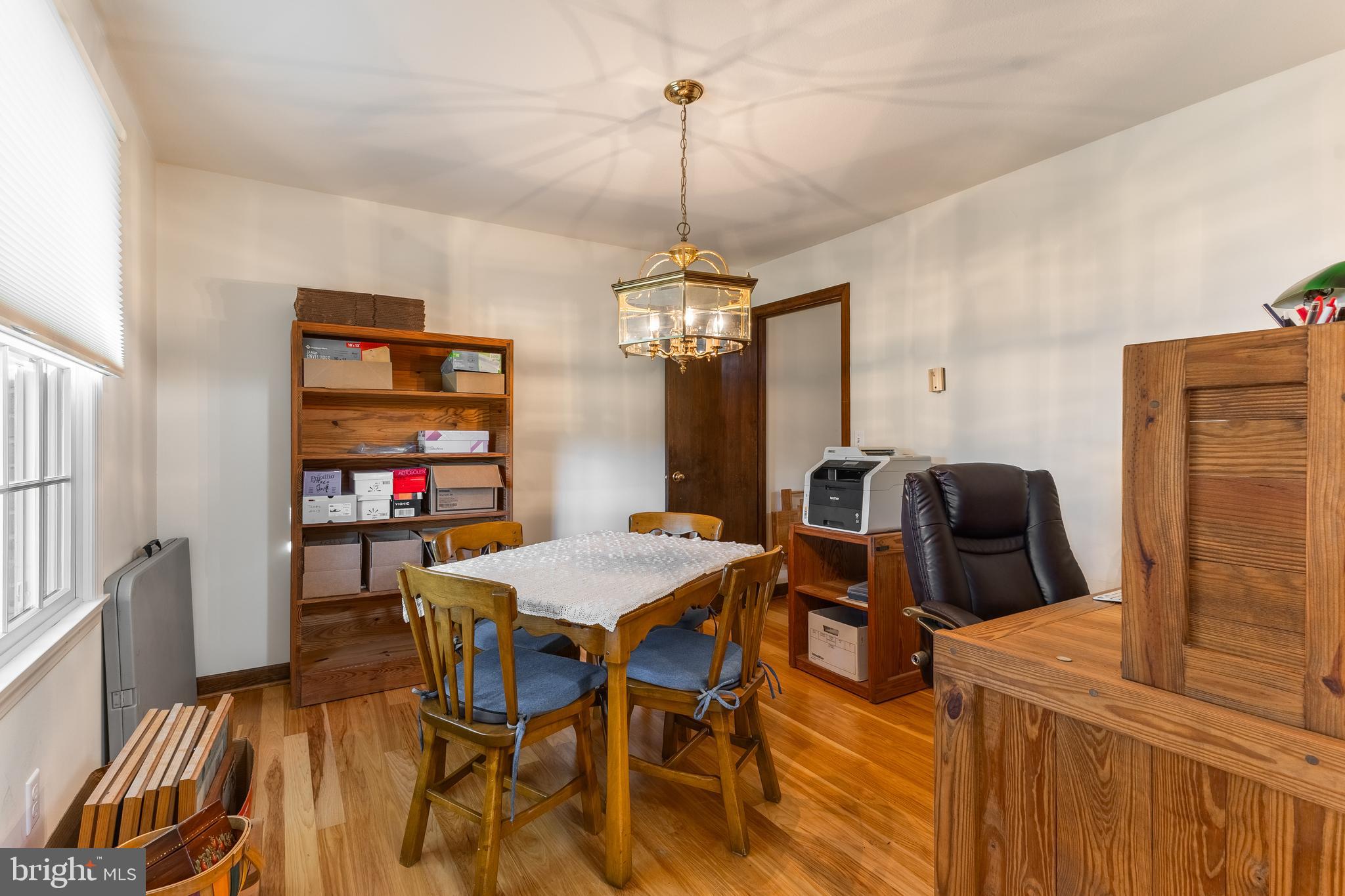 212 Seneca Circle State College, PA 16801 - Photo 34 of 67 a kitchen that has a table chairs and a wooden floor