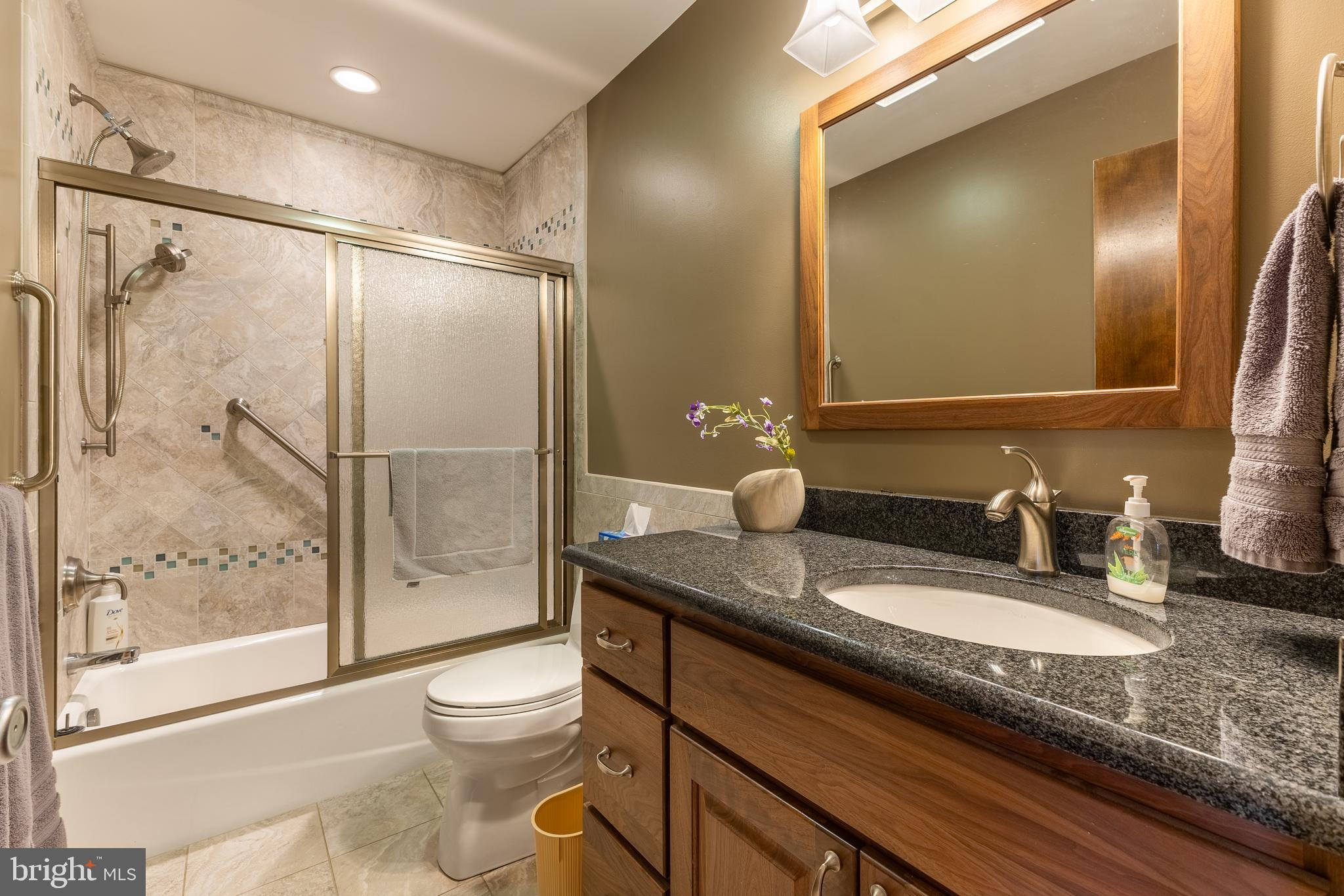 212 Seneca Circle State College, PA 16801 - Photo 42 of 67 a bathroom with a granite countertop sink toilet and shower