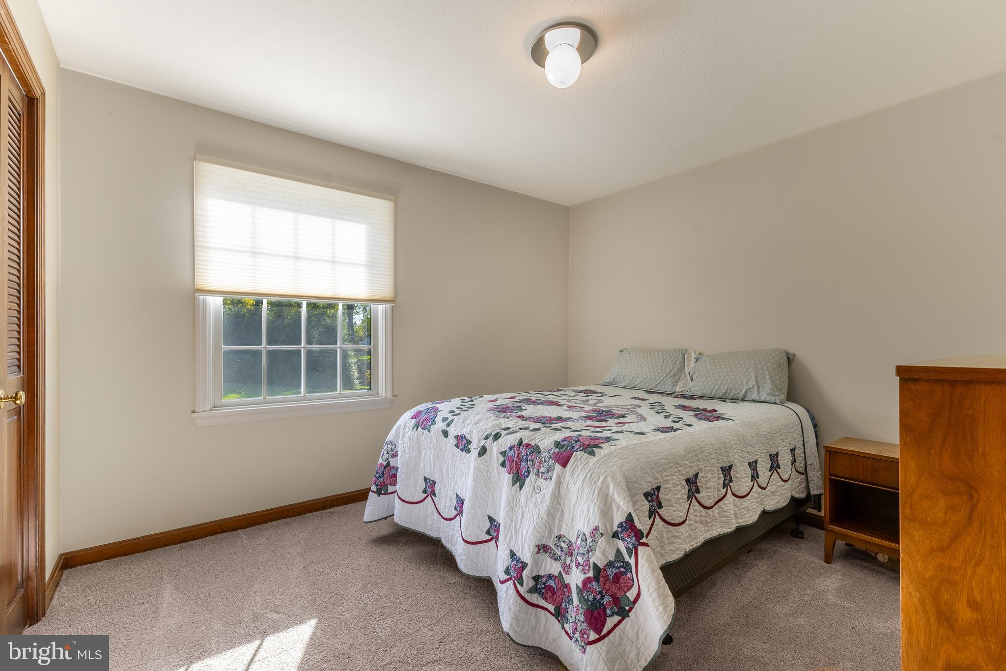 212 Seneca Circle State College, PA 16801 - Photo 44 of 67 a bedroom with a bed and a window
