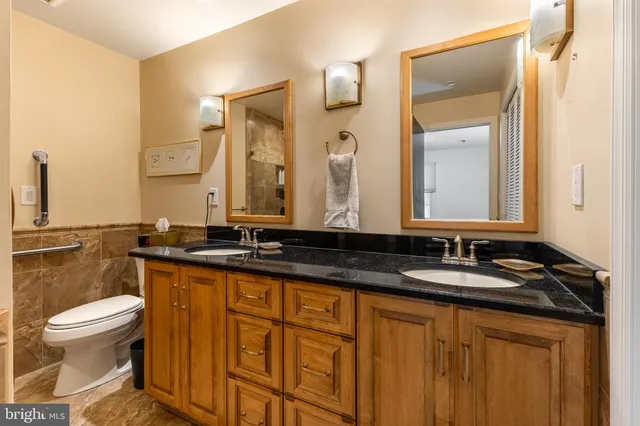 a room with furniture and a floor to ceiling window