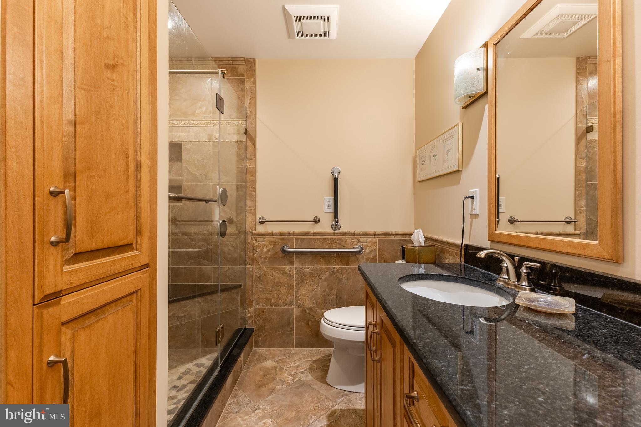 212 Seneca Circle State College, PA 16801 - Photo 48 of 67 a bathroom with a granite countertop sink toilet and shower