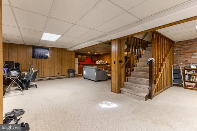 a view of a house with a small yard