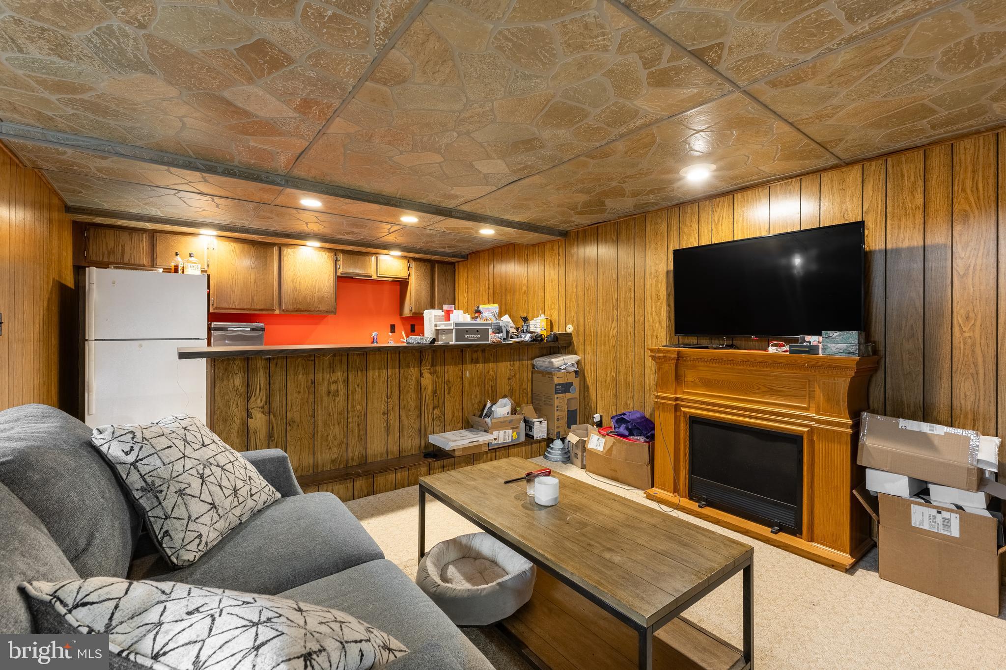212 Seneca Circle State College, PA 16801 - Photo 51 of 67 a living room with furniture and a flat screen tv