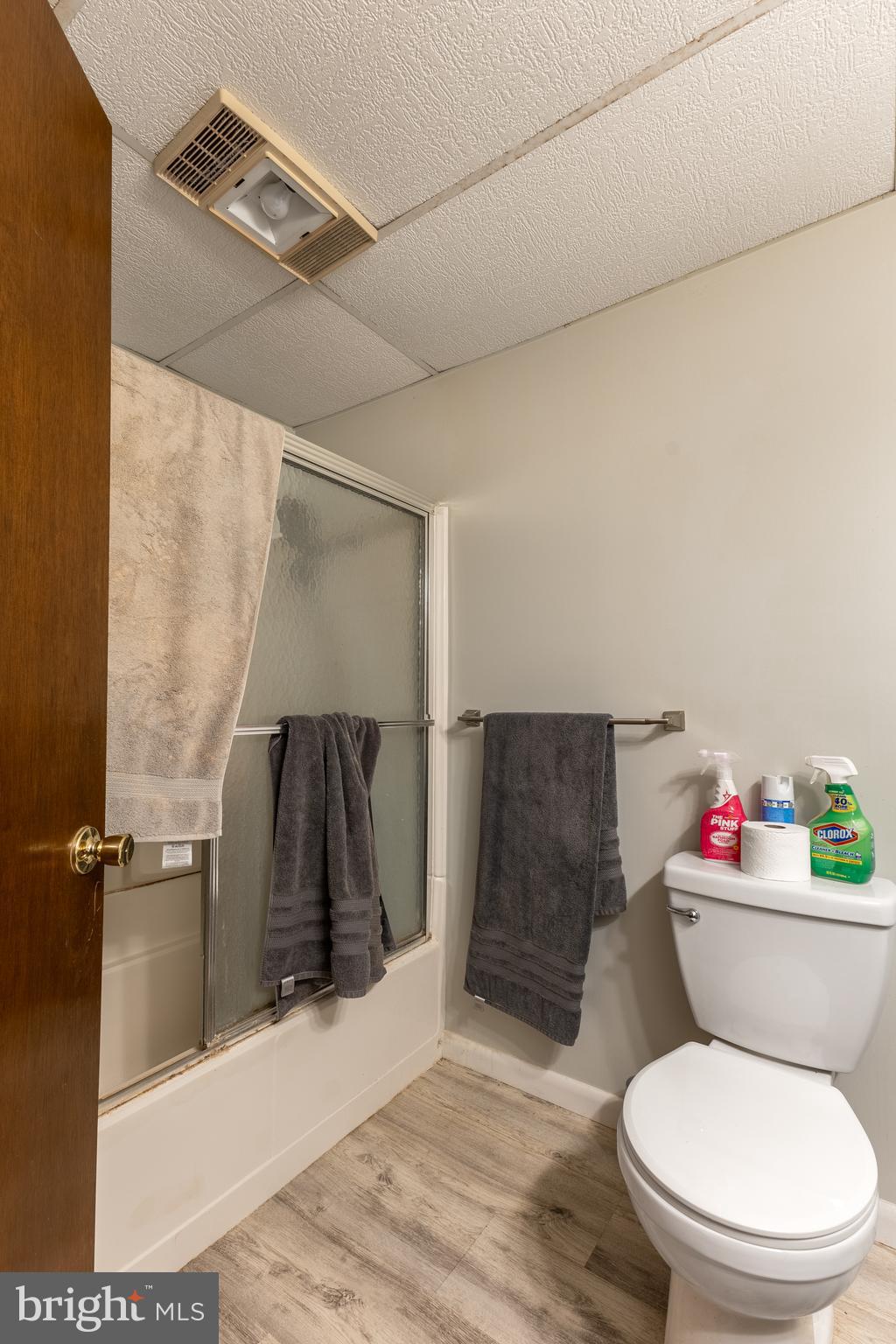 212 Seneca Circle State College, PA 16801 - Photo 54 of 67 a white toilet sitting next to a bathroom sink and a shower