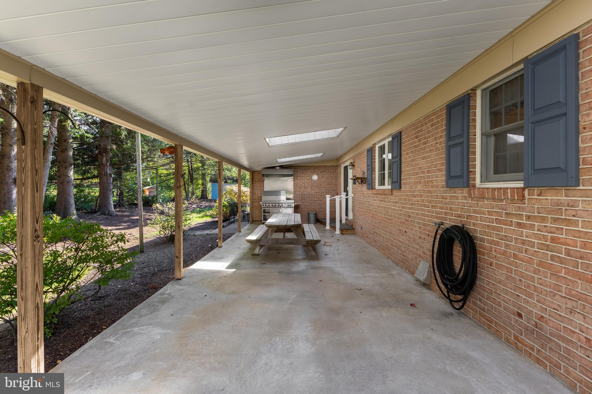 212 Seneca Circle State College, PA 16801 - Photo 63 of 67 a view of a porch with furniture and floor to ceiling window