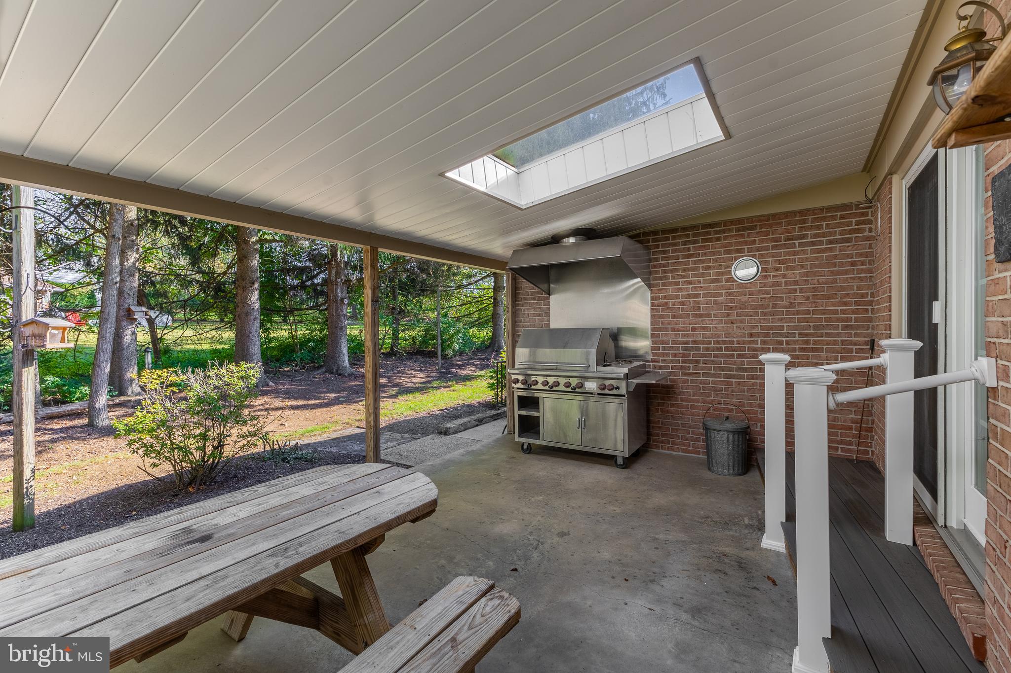 212 Seneca Circle State College, PA 16801 - Photo 64 of 67 a room with furniture and a floor to ceiling window