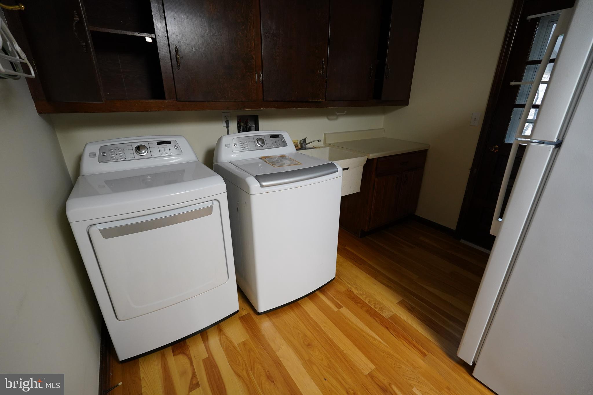212 Seneca Circle State College, PA 16801 - Photo 9 of 67 a utility room with dryer and washer