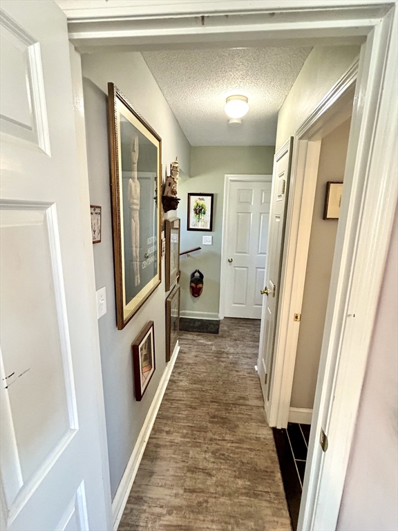 700 2nd Street, Unit 105 Fall River, MA 02721 - Photo 13 of 16 a view of a hallway with windows and stairs