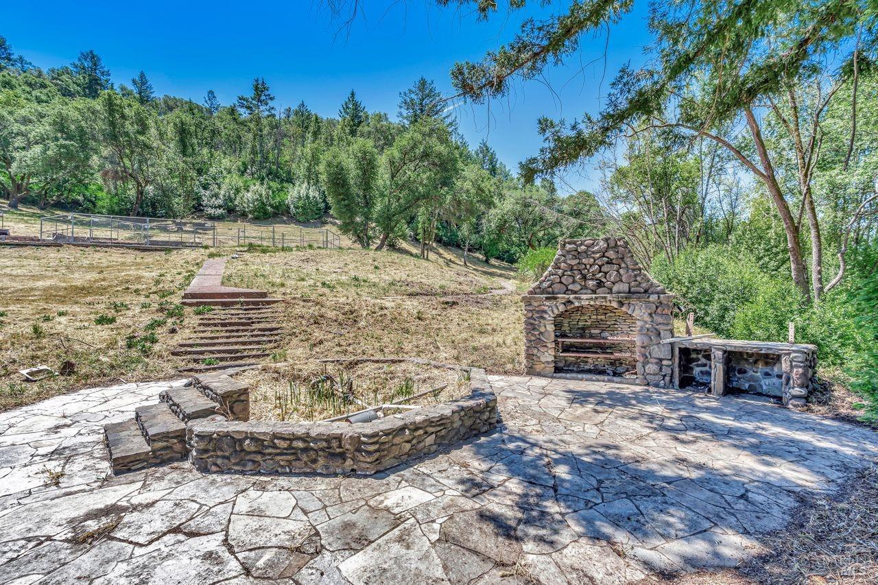 1400 Riebli Road Santa Rosa, CA 95404 - Photo 3 of 48 a view of a terrace with a bench