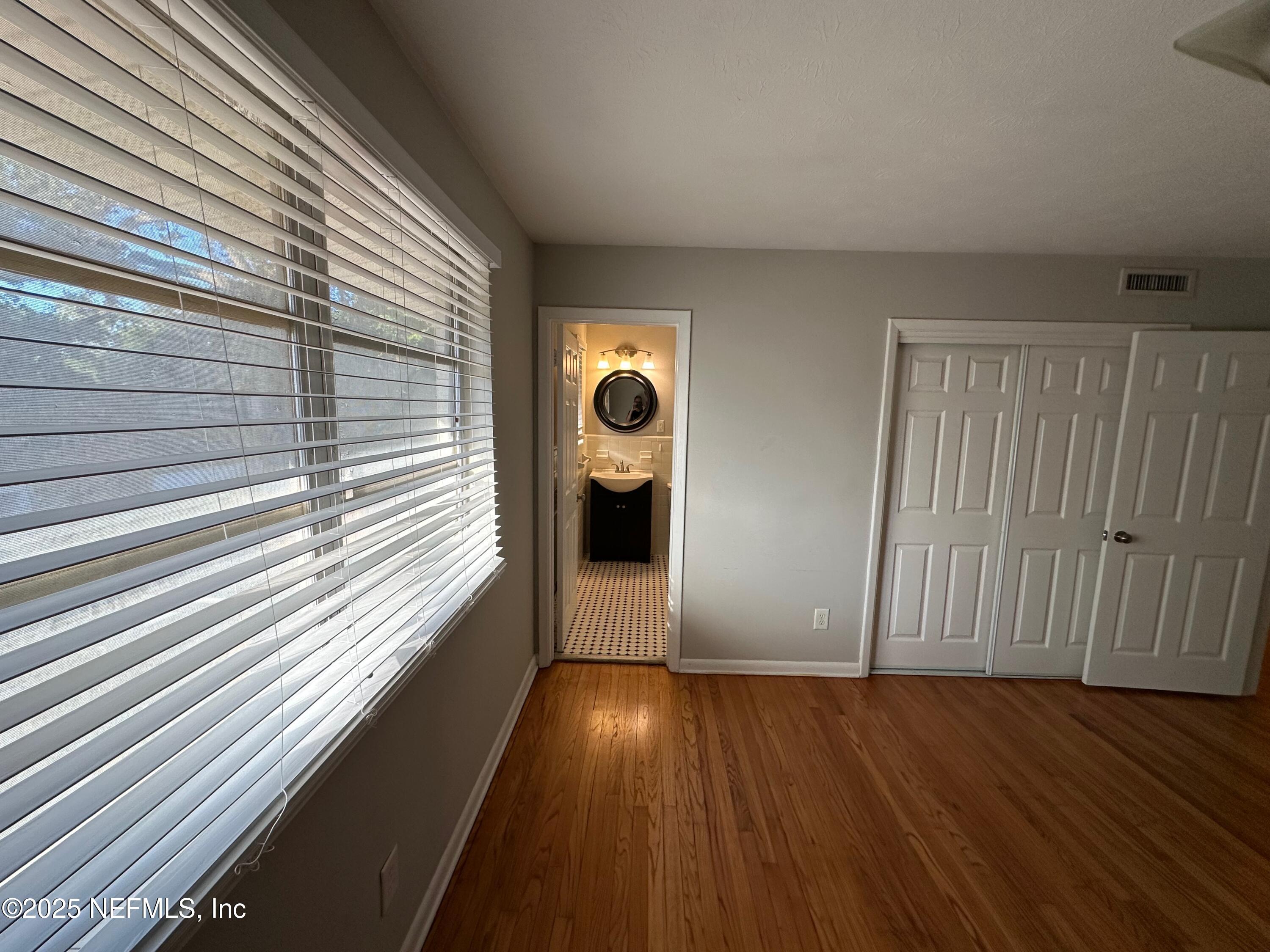 1120 Cedar Street, Unit F Jacksonville, FL 32207 - Photo 13 of 19 a view of entryway with wooden floor