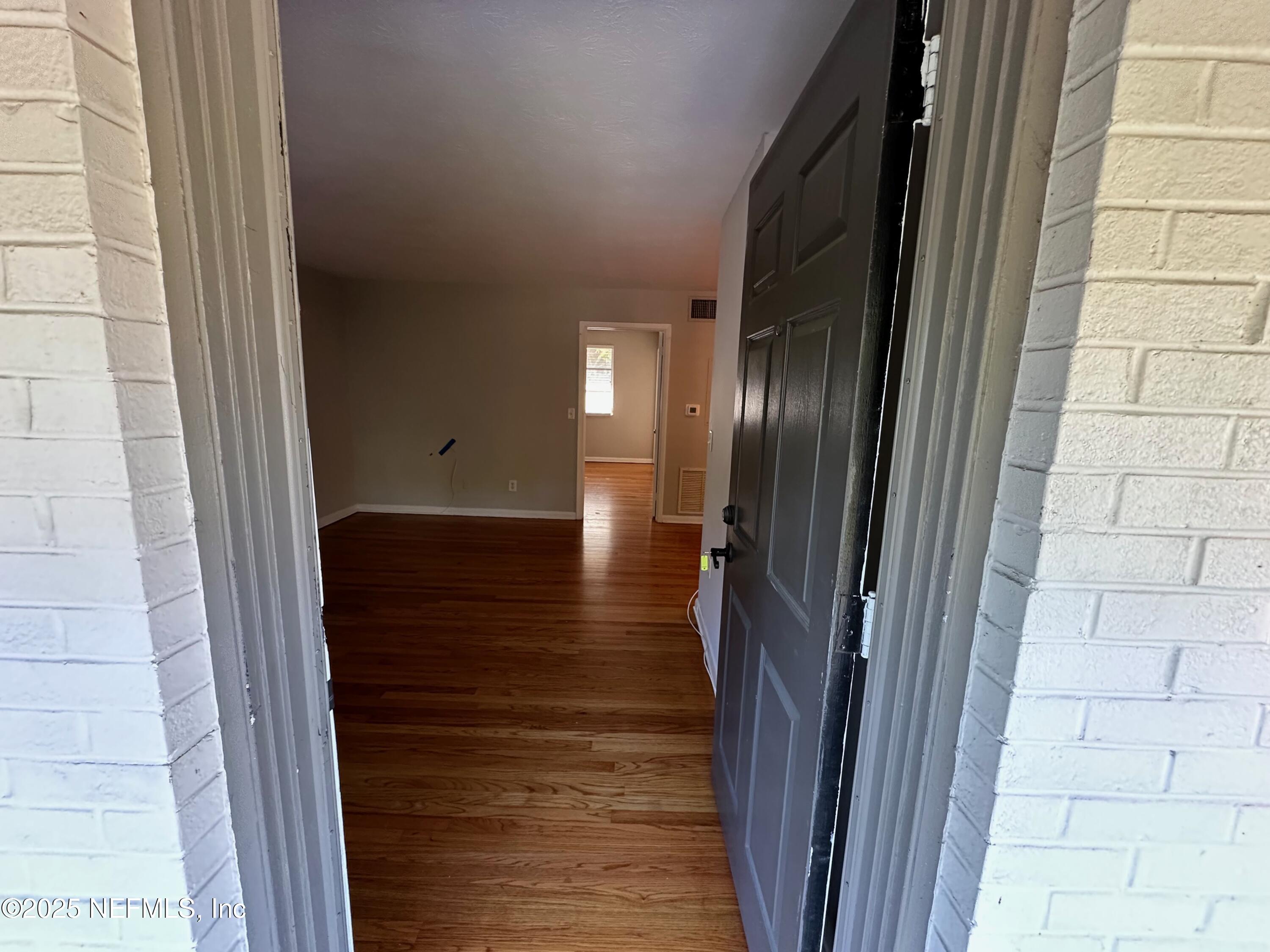 1120 Cedar Street, Unit F Jacksonville, FL 32207 - Photo 3 of 19 a view of a hallway