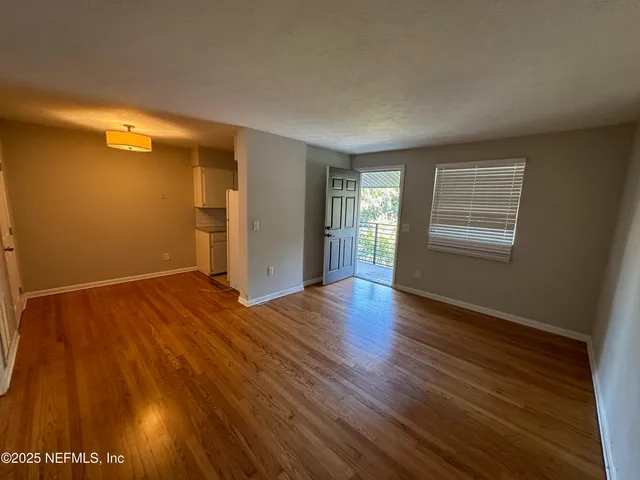 a view of a storage & utility room with wooden floor