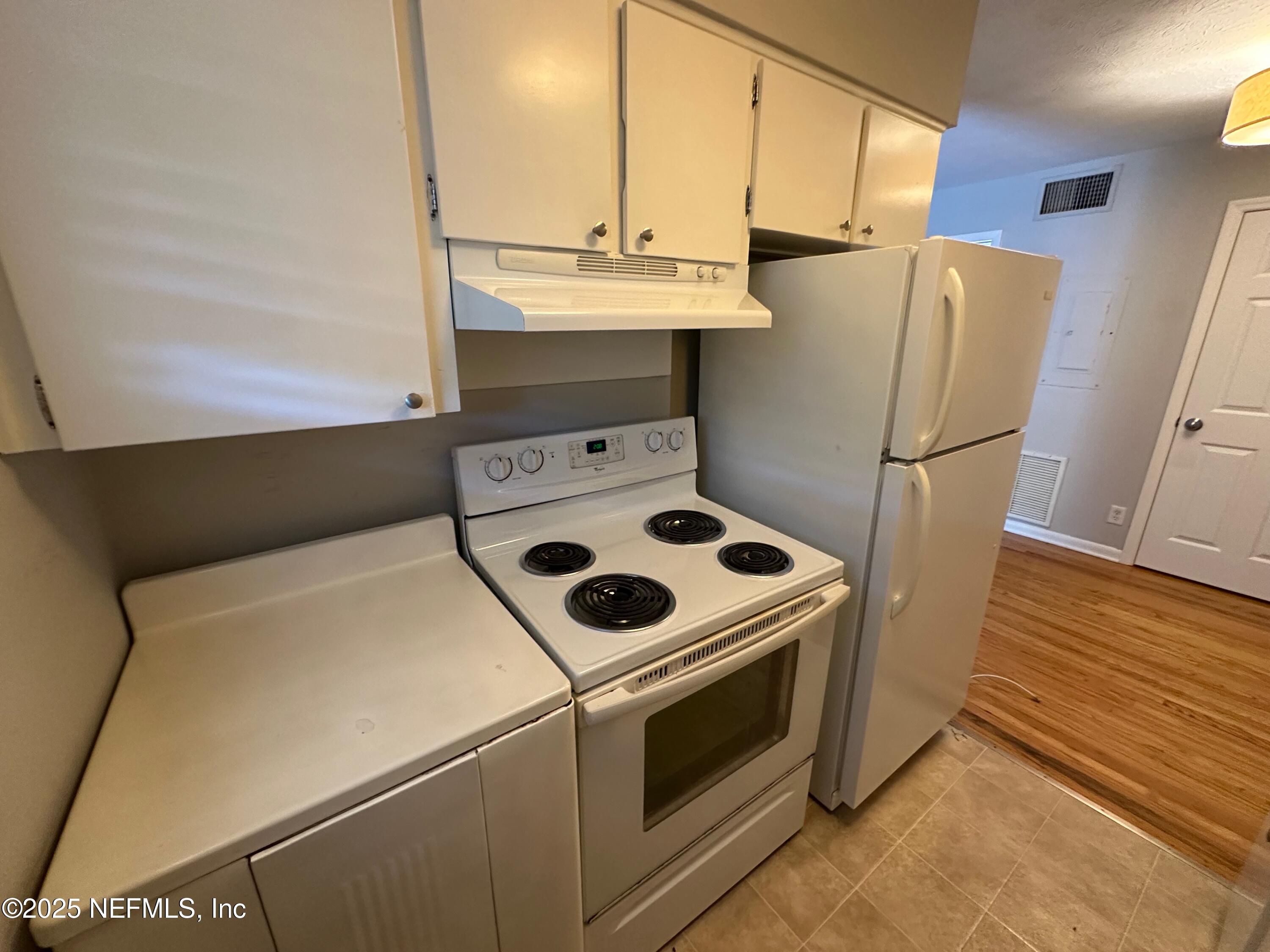 1120 Cedar Street, Unit F Jacksonville, FL 32207 - Photo 9 of 19 a utility room with dryer and washer