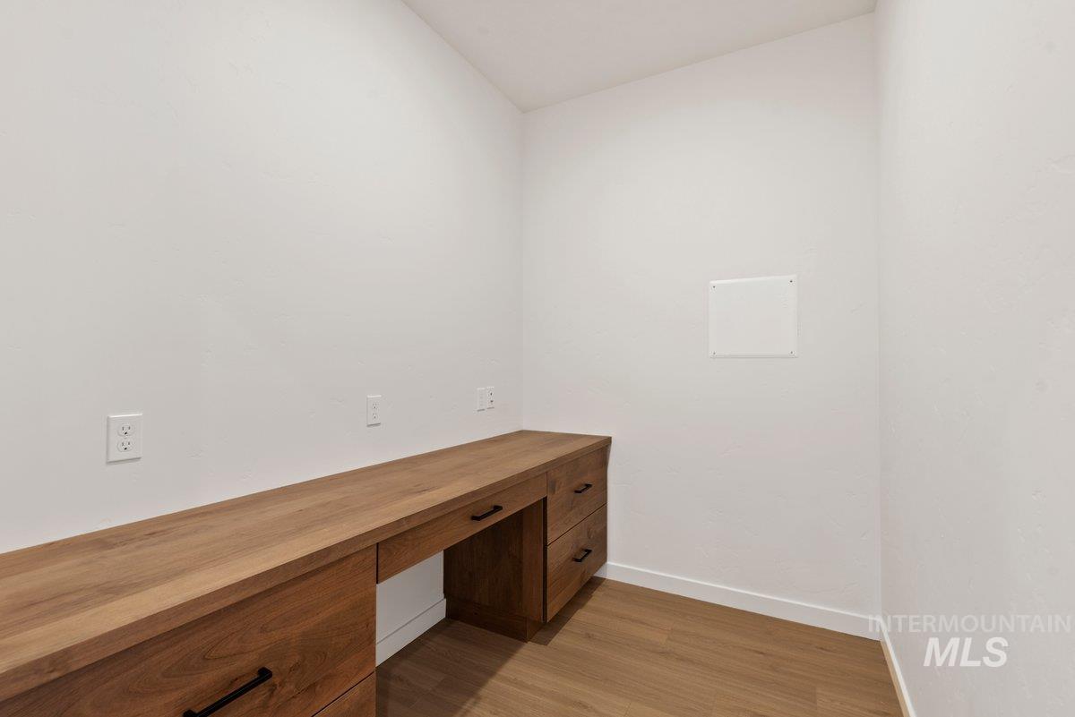 2025 West Bittern Street Nampa, ID 83686 - Photo 13 of 32 Unfurnished office featuring light wood-type flooring and built in study area