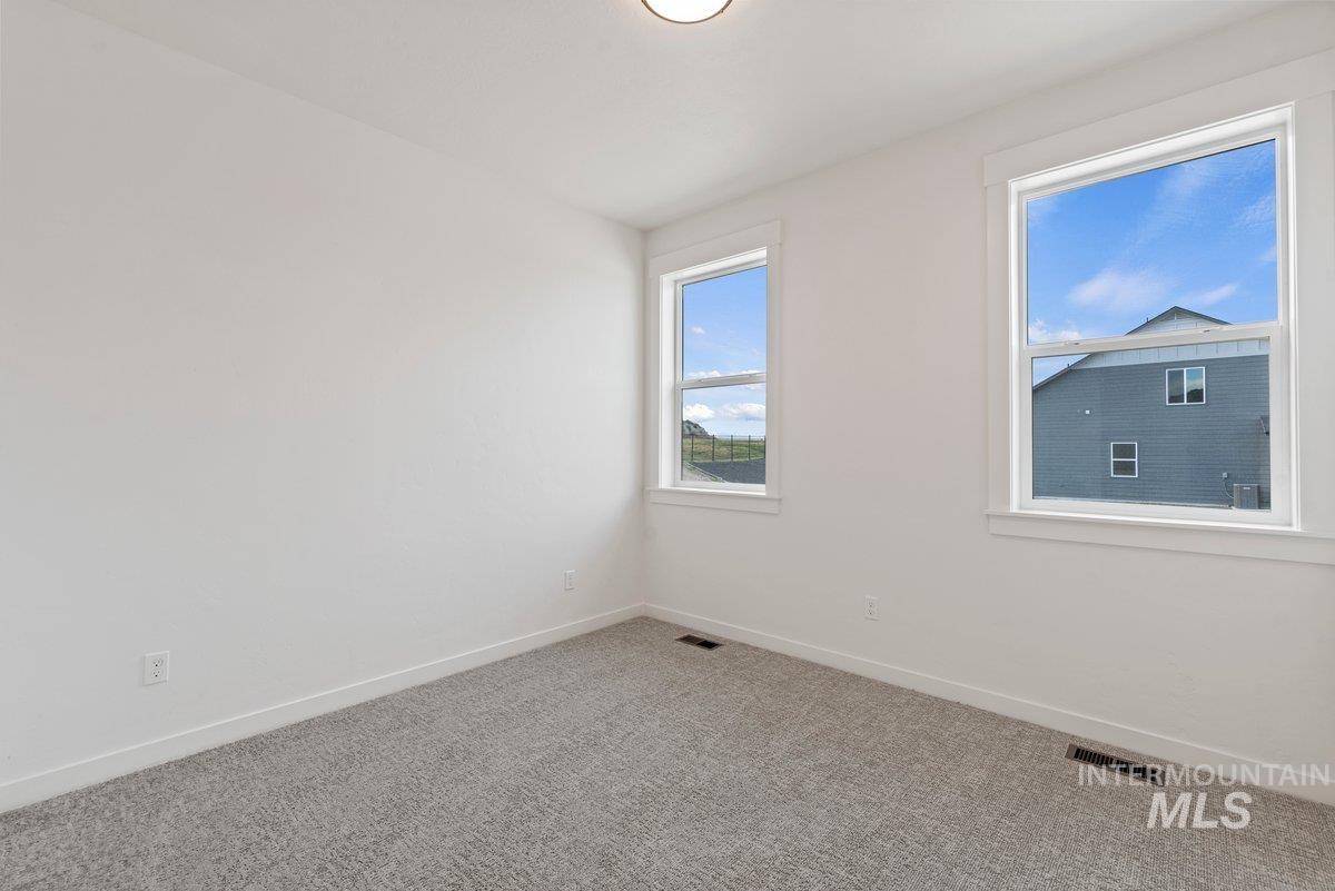 2025 West Bittern Street Nampa, ID 83686 - Photo 24 of 32 Empty room featuring carpet flooring