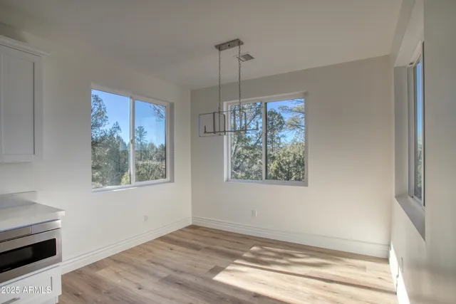 a kitchen that has a sink and a stove