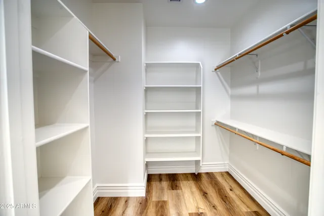 a bathroom with a tub and shower