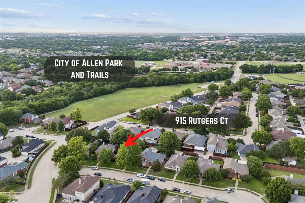 915 Rutgers Court Allen, TX 75002 - Photo 2 of 39 Aerial view toward the park. The view encompasses the ball fields to the east of the middle school.