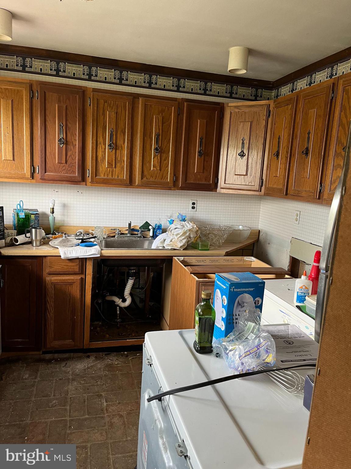 12 Trellis Road Levittown, PA 19056 - Photo 8 of 19 a kitchen with a sink and a cabinets