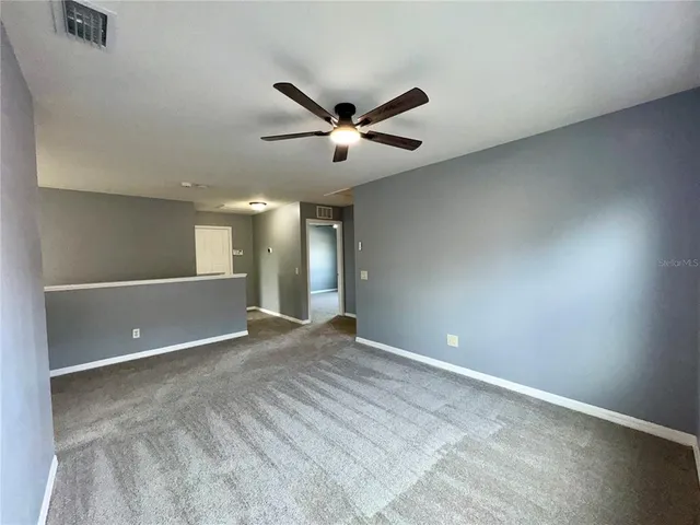 a bathroom with a shower and a sink