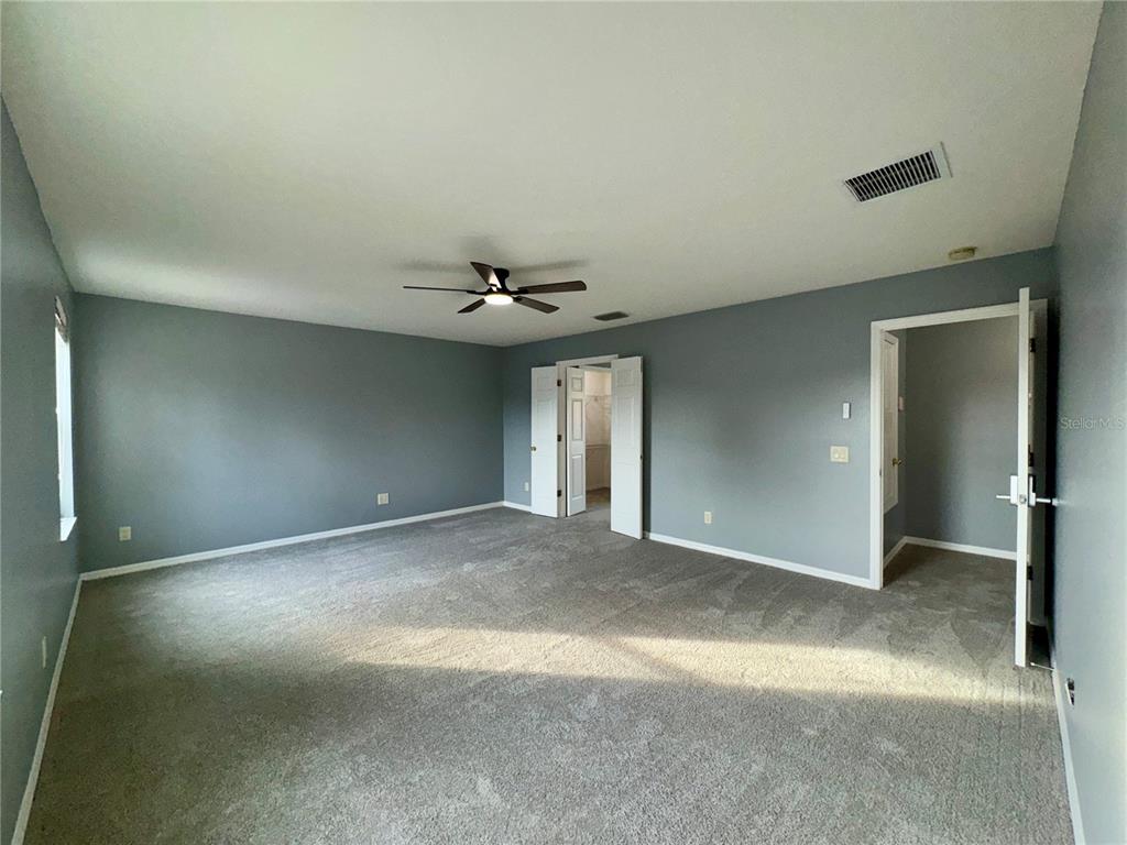 18403 Fish Loop Land O Lakes, FL 34638 - Photo 35 of 64 a view of an empty room with a window