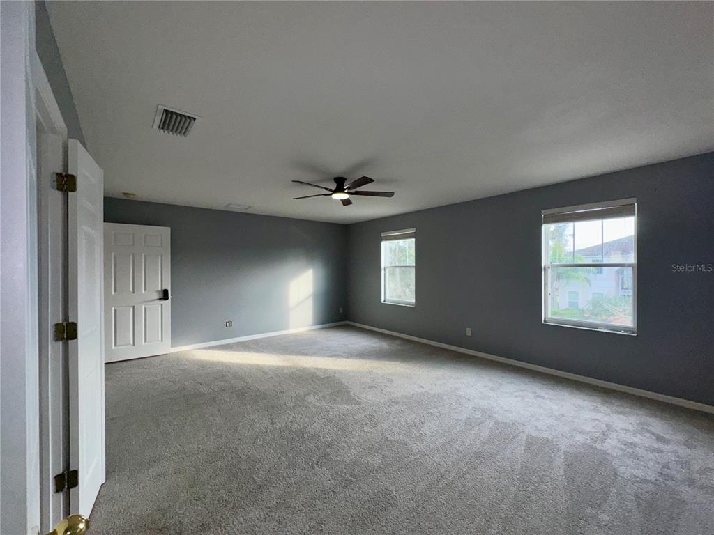 18403 Fish Loop Land O Lakes, FL 34638 - Photo 37 of 64 a view of an empty room with a window