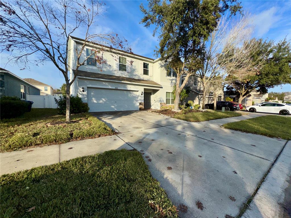 18403 Fish Loop Land O Lakes, FL 34638 - Photo 4 of 64 a view of a house with a yard