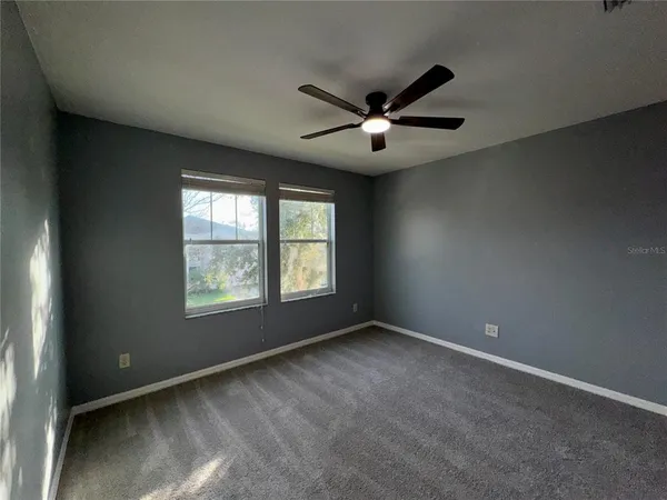 a backyard of a house with lots of green space