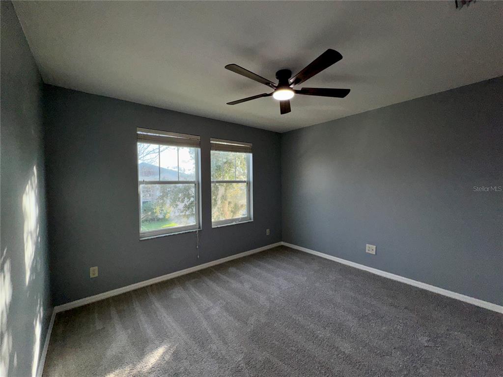 18403 Fish Loop Land O Lakes, FL 34638 - Photo 50 of 64 a view of an empty room with a window