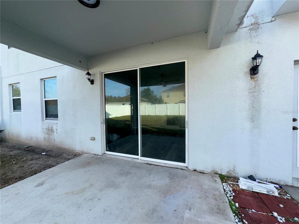 18403 Fish Loop Land O Lakes, FL 34638 - Photo 56 of 64 a view of an empty room with a window