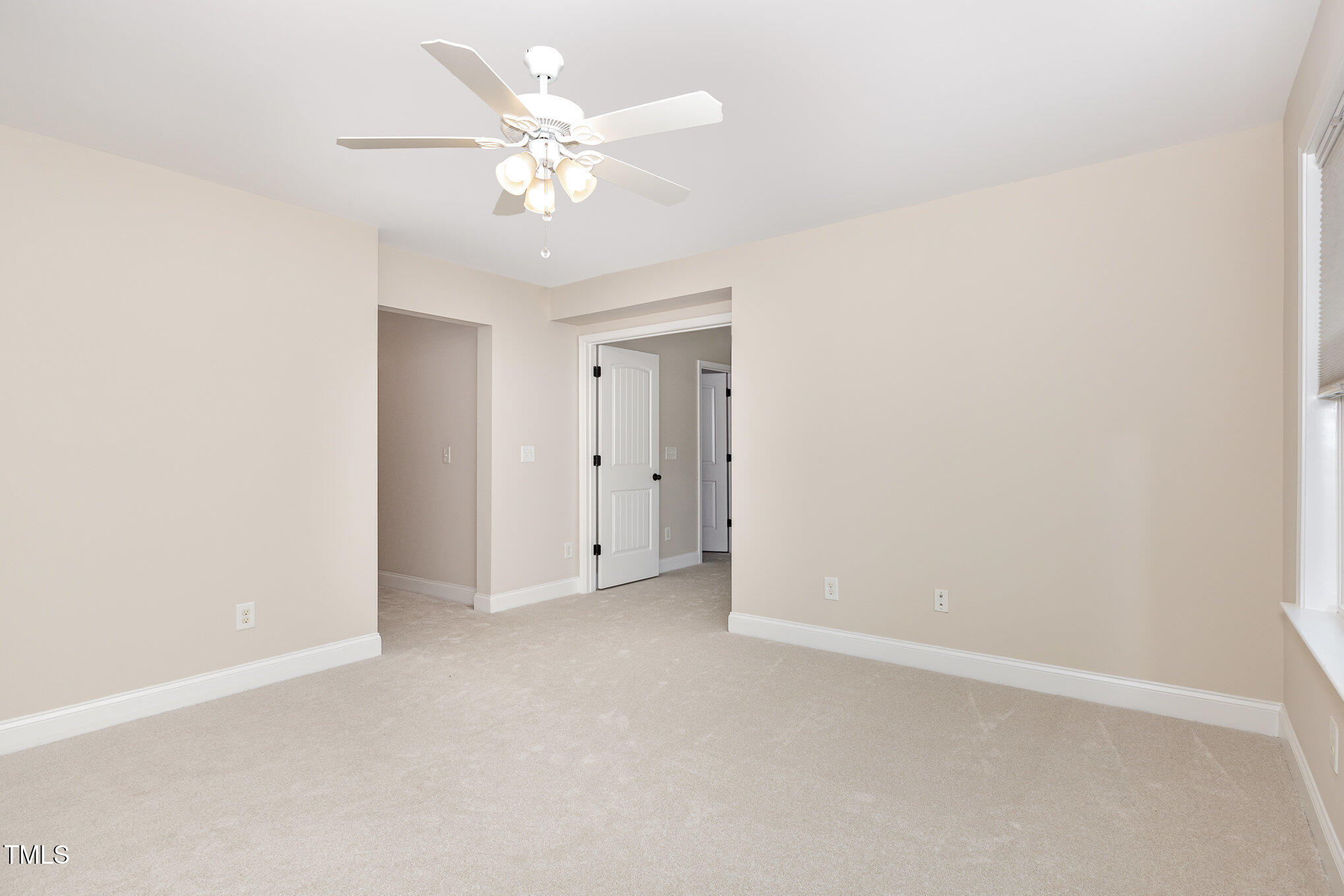 1304 Barnford Mill Road Wake Forest, NC 27587 - Photo 24 of 40 an empty room with a ceiling fan and a window