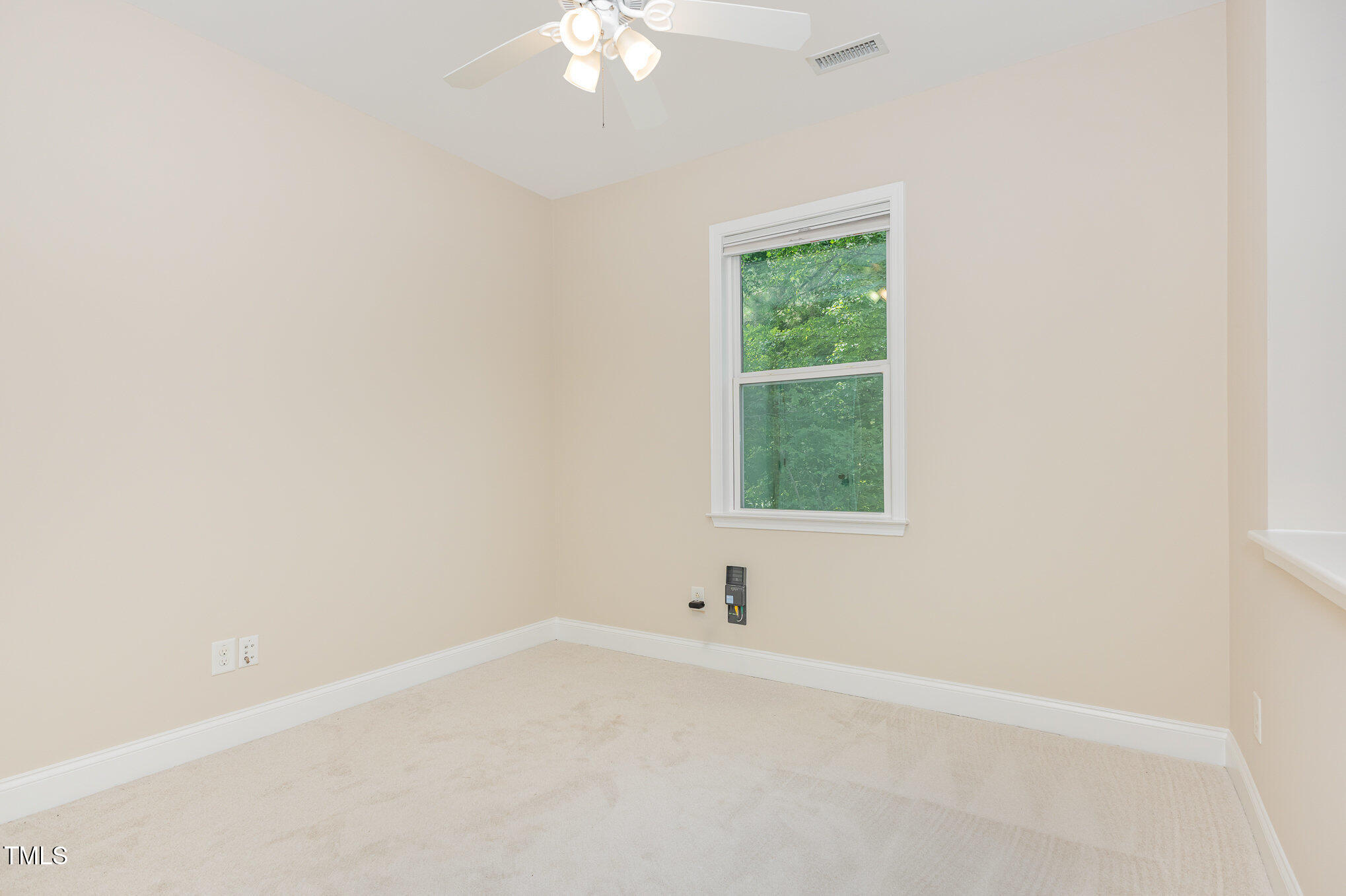 1304 Barnford Mill Road Wake Forest, NC 27587 - Photo 25 of 40 an empty room with a window