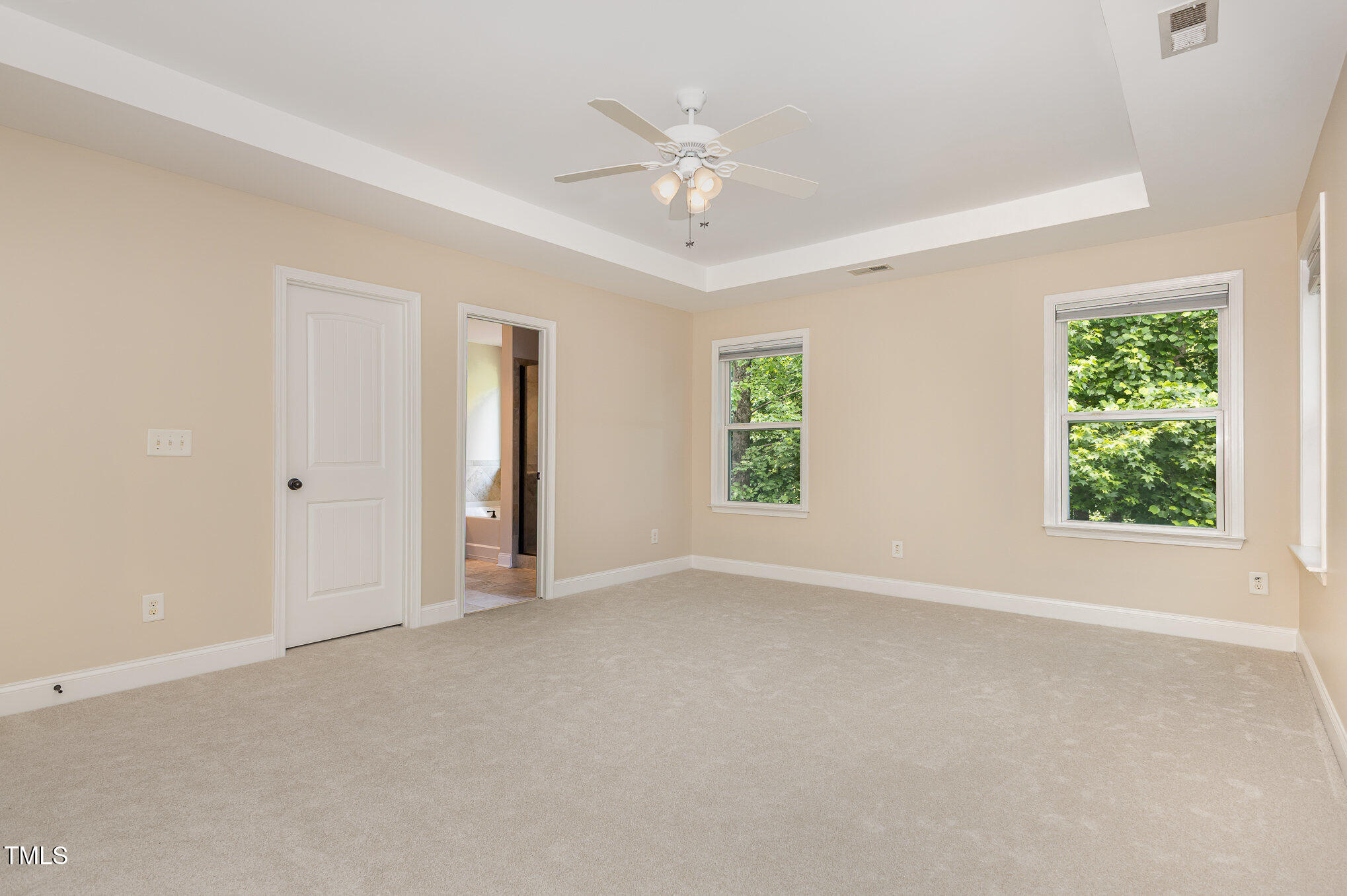 1304 Barnford Mill Road Wake Forest, NC 27587 - Photo 27 of 40 an empty room with a ceiling fan and window