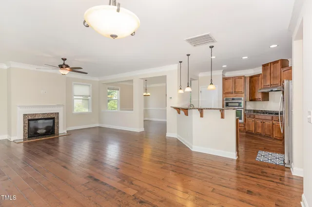 a view of an entryway with wooden floor