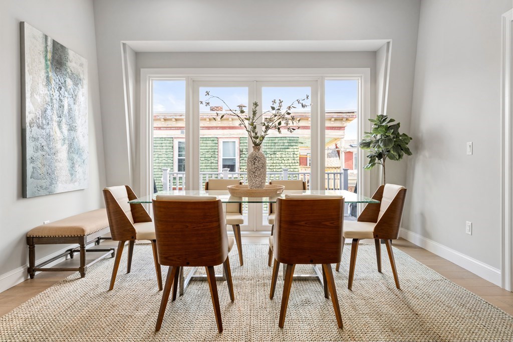 54 Pleasant Street, Unit 5 Boston, MA 02125 - Photo 13 of 23 a dining room with furniture and window