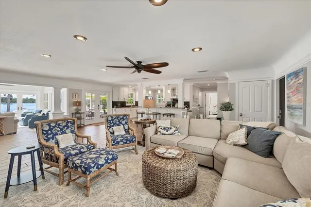 a kitchen with sink and refrigerator