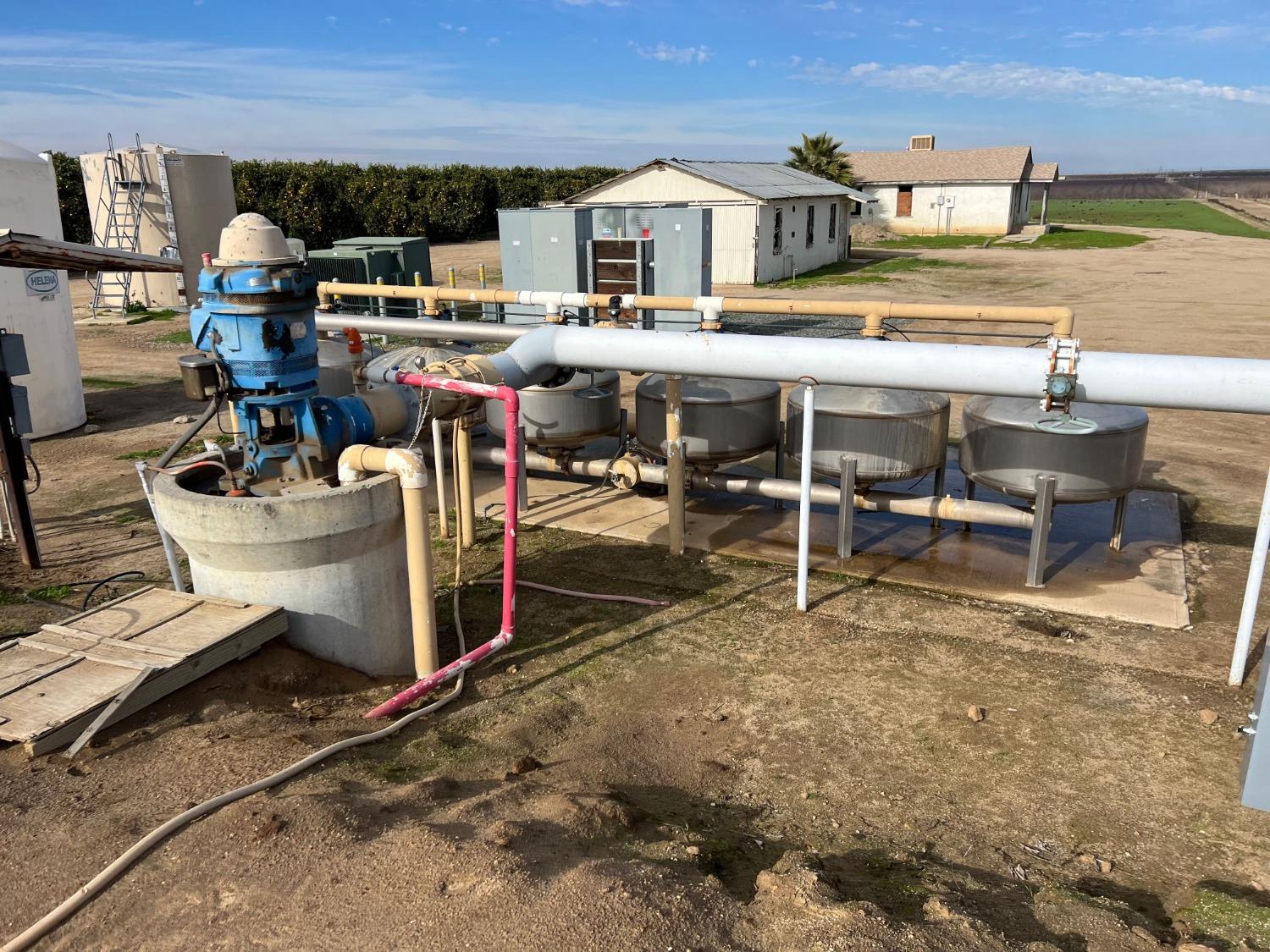 32717 Kimberlina Road Bakersfield, CA 93308 - Photo 14 of 19 a room with lots of wooden furniture and a view of living room