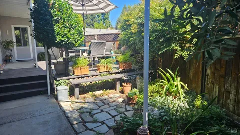 a backyard of a house with lots of green space