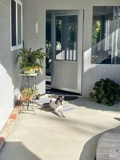 a view of table and chair in wooden floor