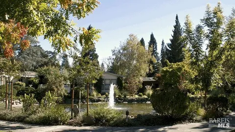 a view of a lake with a garden