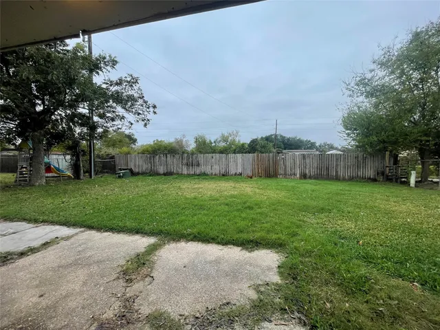 a view of a backyard with a garden