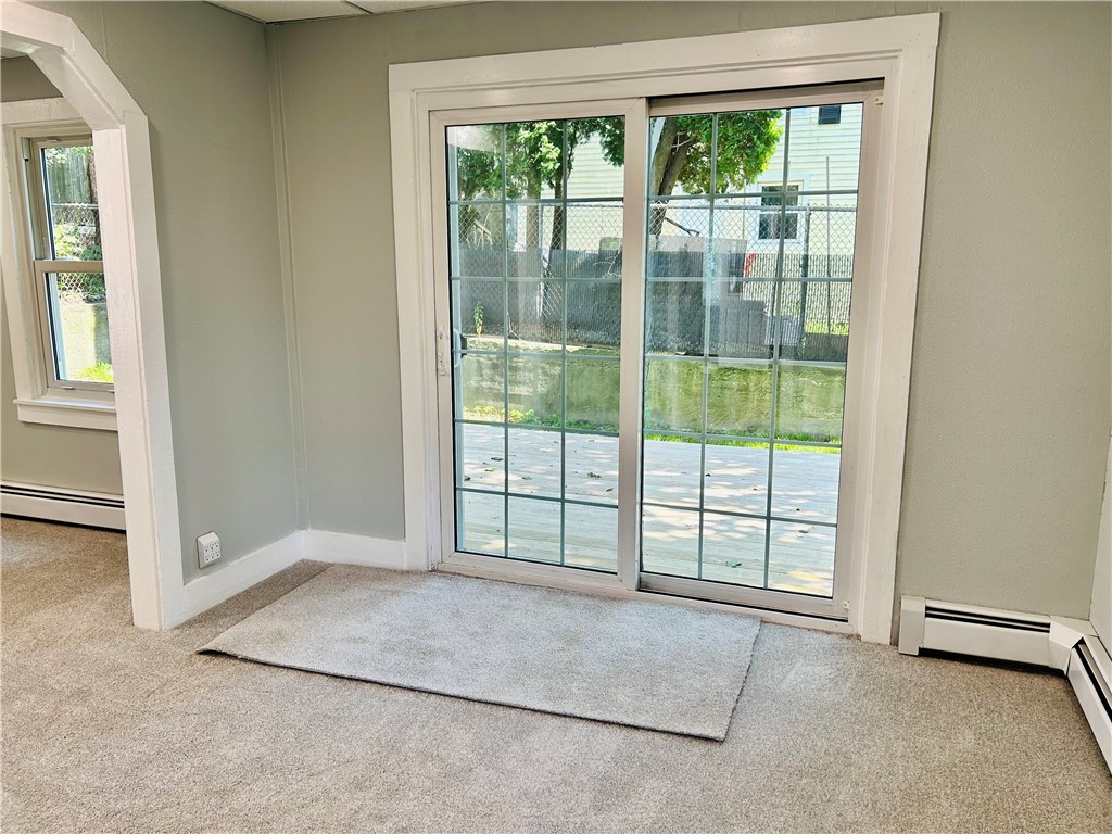95 Crawford Street Woonsocket, RI 02895 - Photo 8 of 26 Sliding doors to back yard.