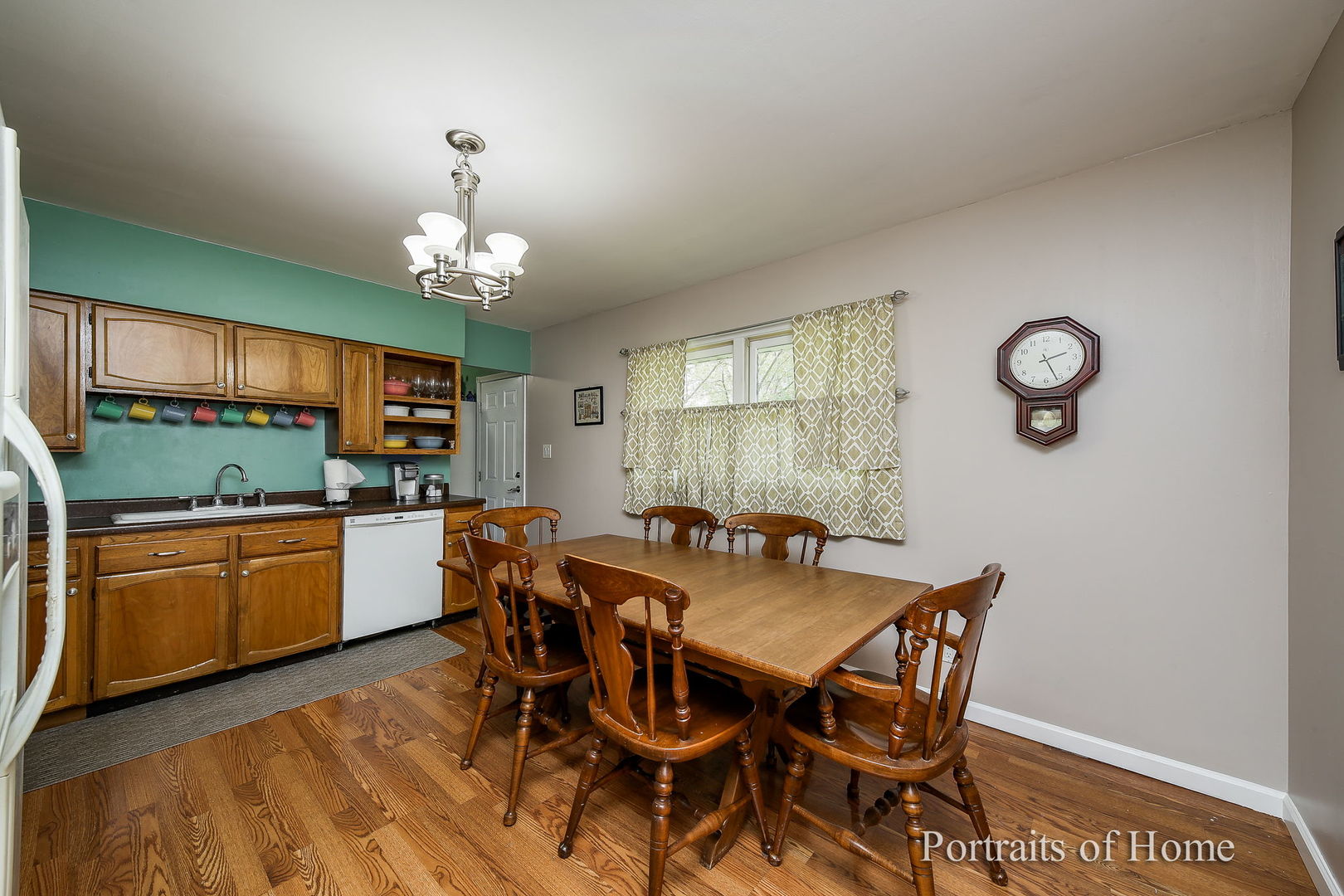 310 Audubon Road Streamwood, IL 60107 - Photo 3 of 10 a view of a dining room with furniture window and wooden floor