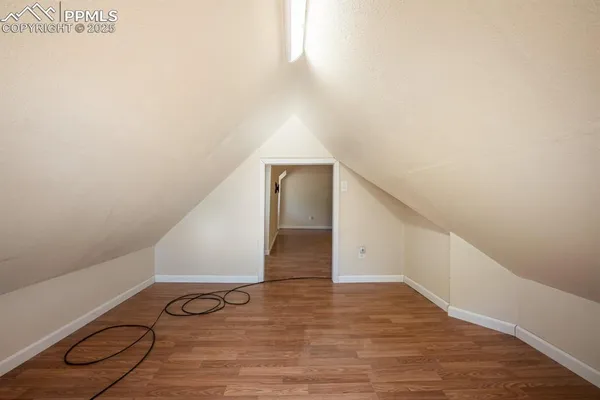 a view of entryway with wooden floor