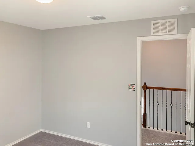 a view of a hallway with closet