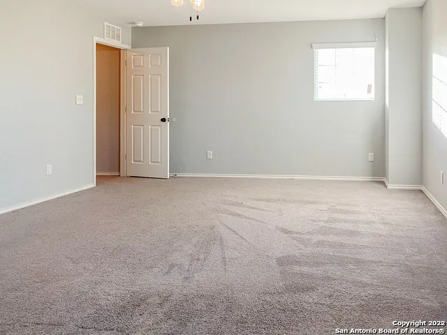 an empty room with an entryway