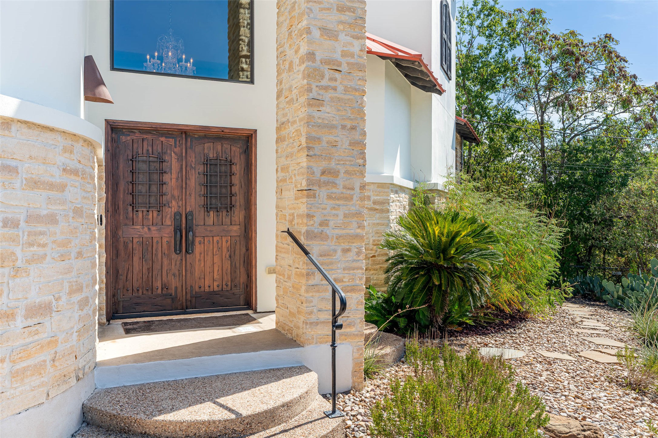 1300 Bluff Street Austin, TX 78704 - Photo 7 of 40 Grand entrance doors with speakeasy windows.