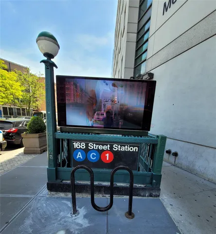a view of a room with furniture wooden floor and window
